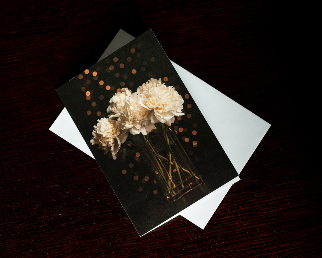 Floral gift card of white flowers with white envelope