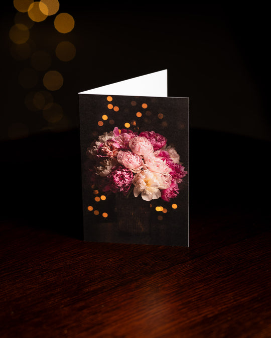 gift card with pink and white peonies and christmas lights