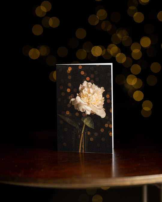 Bridal shower peony christmas card with fairy lights in the back